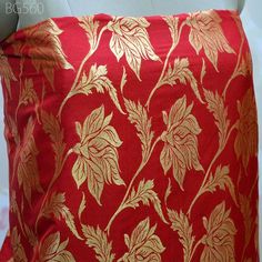 Red Brocade by the yard Fabric Home Furnishing Wedding Dress Gown Bridal Gown Making Banarasi Brocade crafting costume fabric Cushion Cover. This is a beautiful benarse blended silk brocade fabric in Red and Gold.  ➤Product: Brocade Fabric ➤Fabric Type: Blended Silk (Viscose and Silk) Fine quality Zari Brocade Weaving from Banaras ➤Color: Red and Gold ➤Width: 44 inches. ➤Condition: New ➤ Code: bg560 ➤Listing for 1 Yard of fabric. ➤Care: Dry Clean Only You can use this fabric to make Dresses, Tops, Blouses, Jackets, Crafting, Clutches or Evening Bags, Embellish your clothes, Pillows, Drapery, Home Décor, Outdoor, Quilting, Sewing, General, Upholstery etc use it for scrap booking projects. If you purchase more than 1 Yard you will get it in running length, not in pieces. Please note: Any cus Red Brocade Dupatta With Traditional Drape, Red Unstitched Brocade Lehenga, Festive Red Brocade Fabric, Traditional Red Brocade Embroidered Fabric, Traditional Red Fabric With Pallu, Red Brocade Dupatta, Red Wedding Fabric With Zari Work, Red Brocade Lehenga With Motifs, Red Brocade Lehenga For Puja