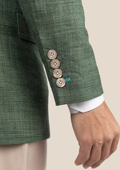 Be bold and indulge in the luxurious Aspen Green Hopsack Jacket. Custom made from a luxurious bamboo/wool/linen/silk blend from Cavani, perfect for those who want to feel bold and exude confidence in their style. Elevate your wardrobe and embrace the challenge of standing out! Tailored Linen Tweed Jacket With Hidden Buttons, Green Linen Blazer For Tailoring, Elegant Linen Blazer With Button Cuffs, Green Linen Outerwear With Notch Lapel, Tailored Linen Blazer With Button Cuffs, Formal Green Linen Outerwear, Linen Tweed Jacket With Hidden Button Closure, Green Linen Business Blazer, Elegant Green Tweed Jacket With Pockets