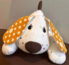 a close up of a stuffed animal on a table