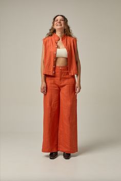 Made of 100% linen fabric, this pant has an elastic waist for added comfort and a straight cut to lengthen the legs. Wear it at the waist or at the hips for a more modern look. Our Reverie collection represents the idea of reconnecting with one's creative self and finding inspiration through moments of deep contemplation and imaginative thinking. COMPOSITION AND CARE Material: 100% linen Linen is one of the most sophisticated natural fiber fabrics. It does not hold or block air, nor does it have Finding Inspiration, Linen Pant, Deep Orange, Linen Pants, Straight Cut, Natural Fibers, Linen Fabric, Elastic Waist, Composition