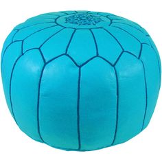 a blue leather poufle sitting on top of a white floor