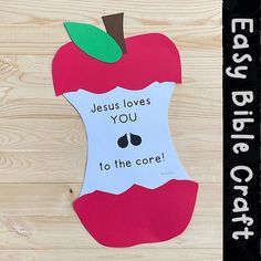 an apple cut out with the words jesus loves you to the core