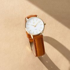 the avenue collection’s pretty and petite design is inspired by the classic style of new york. timeless women’s timekeeping meets an italian tan pebbled leather strap, gold case, and white dial. Leather Watch For Women, Women’s Watch, Brown Watches Women, Classic Watch Women, Everyday Watch, Brown Watches, Watches Women Leather, Watches Women, Women Watches