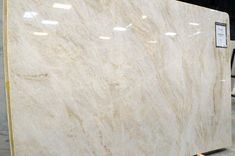 a large white marble slab in a warehouse