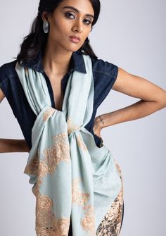 Woven from a fine cashmere, this azure scarf features an exotic dual shade beige - copper chantilly lace application extending at the ends of the scarf. A unique and stunning evening wear accessory to elevate the look of any outfit. Elegant Blue Pashmina Shawl For Festivals, Elegant Dupatta Scarf, Elegant Pashmina Shawl With Traditional Drape, Elegant Blue Shawl For Festive Occasions, Elegant Pashmina Shawl In Traditional Drape, Elegant Silk Scarves In Traditional Drape, Elegant Silk Scarves With Traditional Drape, Luxury Pashmina Shawl Scarf, Elegant Blue Pashmina Shawl