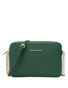 Michael Michael Kors let you show your classic style with this must have saffiano leather crossbody. Zipper top closure. Adjustable crossbody strap. Signature gleaming logo hardware. Flat base. Lined interior features slip pocketsMeasurements: Bottom Width: 9.5 in. Depth: 2 in. Height: 6.25. in Color: Moss Sac Michael Kors, Large Crossbody Bags, Leather Camera Bag, Michael Kors Crossbody Bag, Crossbody Wallet, Prada Handbags, Zipper Top, Handbags Michael Kors, Kors Jet Set