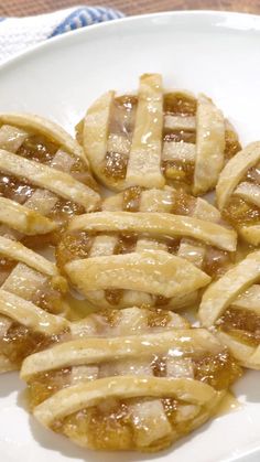 several pieces of pie on a white plate