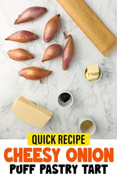 the ingredients for cheese onion puff pastry tart are displayed on a marble countertop