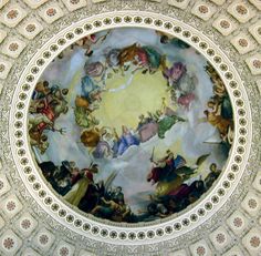 the ceiling is painted with many different colors and designs, including angels flying through the sky