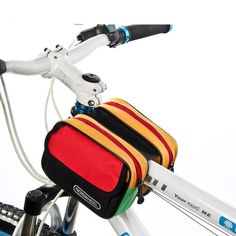 a close up of a bike handlebar with a bag on the front and side