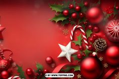 a red christmas background with holly, ornaments and candy canes