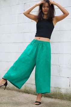 M E A S U R E M E N T S Waist 26 in. up to 40 in. (max with elastic band) Hips up to 54 in. Wide leg circumference 30 in. Inseam 23 in. Pocket 2 pockets Total length 35 in. Material High quality linen fabric M O D E L * Size US4 * Height 5 ft. 4 in. or 163 cm. With or without 4 in. high heels. These pants are a new addition to our linen pants collection. They're made with high quality linen with high end detailing and are tailored to make you look and feel your best! The pants are very roomy wit Green Non-stretch Pants For Vacation, Green Full-length Vacation Bottoms, Full Length Green Vacation Bottoms, Green Ankle Pants For Beach, Green Ankle-length Beach Pants, Wide Leg Capris For Beach, Green Full-length Pants For Vacation, Green Loosely Fitted Harem Pants Ankle Length, Loosely Fitted Green Harem Pants Ankle-length