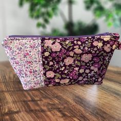 This little pouch has so many uses. Great to help keep your purse organized or use it when traveling. Can be used to keep cell phone chargers organized. The list of uses goes on and on.  Pouch measures 5" X 8 1/2" with zippered top. Made using cotton fabric and polyester batting and polyester zipper.  Hand washing is recommended but can be machine washed. Line dry. Please email any questions you have. Thank you so much for stopping by. Purple Pouch Pencil Case For Daily Use, Purple Pouch Pencil Case For Travel, Purple Cosmetic Bag With Zipper For Daily Use, Purple Rectangular Cosmetic Bag With Zipper, Daily Use Purple Pencil Case With Zipper, Purple Rectangular Cosmetic Bag For Daily Use, Purple Pouch Pencil Case For Everyday Use, Purple Cosmetic Bag Pouch For Everyday Use, Purple Rectangular Cosmetic Bag With Removable Pouch