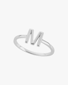 Wear to celebrate your own personal style or as a memento to someone you love. This understated ring is crafted from sleek sterling silver with your choice of initial at the center. Sterling silver Spot clean Made in the United States | The Gild Initial Ring 8 | Sterling Silver Silver Initial Ring Gift, Silver Initial Ring For Gift, Silver Initial Ring As Gift, Elegant Silver Monogram Initial Ring, M Inital Ring, Initial Ring, Personal Shopping, Fair Trade, Labor