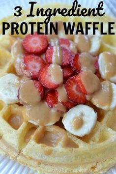 a waffle topped with strawberries and bananas on top of a white paper plate