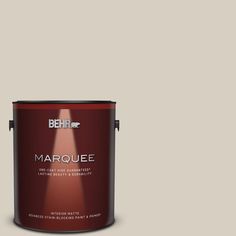 behr marquee interior paint in one gallon, with the light shining on it