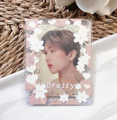 an image of a person with flowers in the background on a card that says pretty