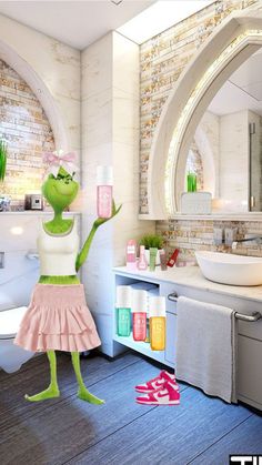 a bathroom with a sink, mirror and green frog doll in it's bathtub