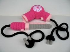 a crocheted hair dryer and other items on a table