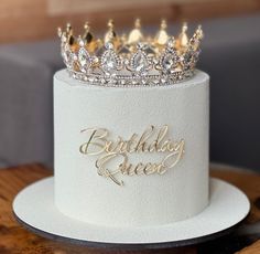 a birthday cake with a crown on top