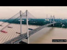 an aerial view of a bridge over water