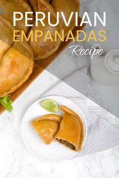 an empanada recipe on a white plate with lime wedges next to it