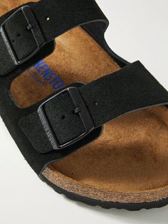 A cult classic, Birkenstock's signature 'Arizona' sandals are designed with comfort in mind. They've been made in Germany from suede with tonal buckled straps and contoured footbeds. Slip yours on with everything from loungewear to jeans. Comfortable Suede Sandals With Buckle Closure, Classic Black Sandals With Adjustable Strap, Classic Suede Sandals With Leather Footbed, Black Suede Sandals With Cushioned Footbed, Black Suede Sandals With Textured Footbed, Comfortable Black Suede Sandals, Suede Slides With Buckle Closure And Round Toe, Classic Suede Sandals With Cushioned Footbed, Classic Suede Slides With Removable Insole