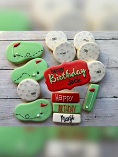 decorated cookies with golf related items displayed on wooden table top, happy birthday to you