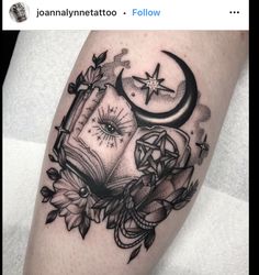 a black and white tattoo with an open book on the left arm, surrounded by flowers