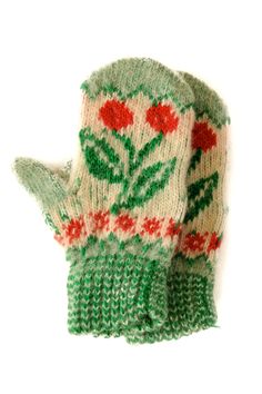 a green mitt with red flowers on it