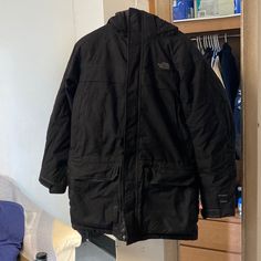 Black, Boys Xl, Used But In Extremely Good Condition And It Comes With A Hood The North Face Cold Weather Outerwear With Pockets, The North Face Outerwear With Pockets For Cold Weather, The North Face Outerwear For Cold Weather With Pockets, The North Face Outerwear For Cold Weather, Casual Black Parka For Work, Black The North Face Outerwear With Pockets, The North Face Parka, North Face Parka, Black North Face