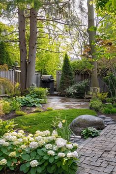 a garden with white flowers and trees in the background, surrounded by brick walkways