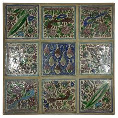 six tiles with different designs on them, all in gold and blue colors - each one has peacocks