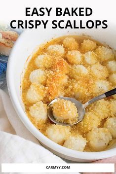 a bowl filled with baked crispy scallops on top of a table