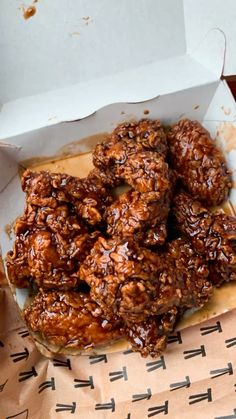 a box filled with cookies sitting on top of a table