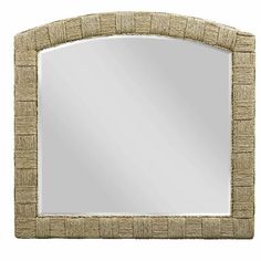 a mirror that is made out of wood and has a woven frame on the front