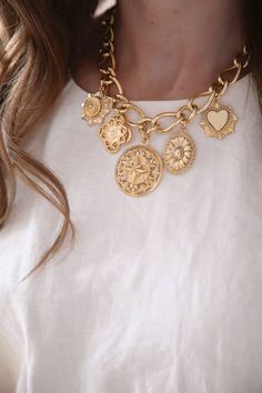 Gold Medallion Chain Necklace With Charms, Gold Medallion Necklace With Vintage Charm, Gold Medallion Necklace With Charms, Gold Charm Necklace With Medallion, Gold Coin Necklace With Charms In Amulet Style, Gold Coin Necklace With Charms Pendant, Gold Coin Necklace With Vintage Charm Pendant, Bohemian Gold Medallion Chain Necklace, Gold Coin Necklace With Charms In Brass