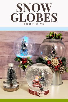 snow globes for diy's with christmas trees and other decorations in them