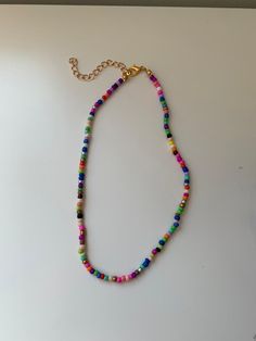 Colourful Beaded Necklace Multicolor Metal Bead Necklaces, Casual Gold Beaded Necklace With Colorful Beads, Casual Multicolor Round Beads Choker, Casual Multicolor Necklaces For Party, Colorful Round Beads Beaded Necklaces For Party, Colorful Metal Beaded Necklaces For Party, Multicolor Beaded Chain Necklace With Metal Beads, Trendy Multicolor Beaded Necklaces With Large Beads, Colorful Round Beads Necklace For Party