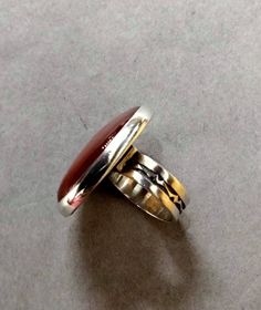 Ancient Touareg ring in silver 925 with an oval agate stone, handmade, very fine. Matter: sterling silver 950, precious stone agate. Origin: before 2002s,mali. Size: 63/4 US. Shipping: Free to the world via DHL. I am always open to offers for one of my items, so please contact me if you would like to make an offer. Please contact me if you have any questions. All items advertised for sale are here in my collection and ready to be shipped worldwide by DHL. Unique Silver Carnelian Rings, Adjustable Silver Carnelian Rings, Touareg Ring, Solid Necklace, Fancy Rings, Magic Ring, Rainbow Beads, Agate Stone, Pendant Set