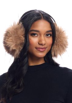 Fur Earmuffs, whimsical and oversized, will make you smile on a gusty, blustery winter day. In super-soft Tan Fox, wispy Black-tipped tufts suggest a fun Leopard vibe. With fur on both the front and back, the muff portion measures about 5½. Affixed to a ¼-wide Black faux leather-wrapped band, the sturdy metal band nearly disappears in the hair. Designed to be comfortably weightless, you'll forget you're wearing them on long walks or when running. Slip them on in the cold, then drop them into a Faux Fur Accessories, Fur Earmuffs, Fabulous Furs, Leather Headbands, Fur Accessories, Cold Weather Outfits, Girl Gang, Earmuffs, Plain Black