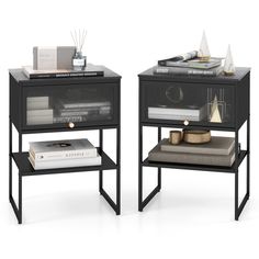 two black side tables with books and magazines on each shelf, one has a lamp