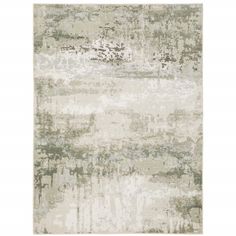 an abstract rug with grey and white colors