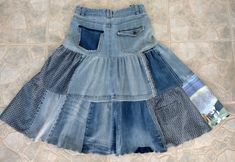 Casual Recycled Denim Skirt For Spring, Casual Fitted Denim Skirt In Recycled Denim, Blue Recycled Denim Skirt For Spring, Blue Recycled Denim Skirt For Summer, Spring Recycled Denim Skirt In Medium Wash, Teared Skirt, Fitted Medium Wash Skirt With Patchwork, Casual Fitted Denim Skirt In Recycled Material, Fitted Denim Tiered Skirt