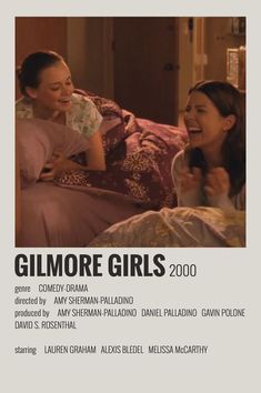 two women laughing on a bed with the caption'gitmore girls 2000 '