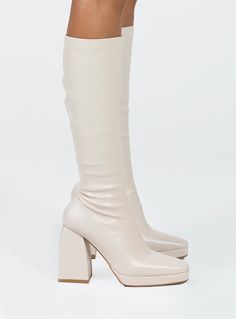 Knee-high boots  Faux leather material  Square toe  Platform base  Block heel  Zip fastening at side  Padded footbed  Heel height: 11cm / 4.33in Knee High Boots Winter, Boots Beige, Knee Length Boots, Pink Formal Dresses, Boots White, Exclusive Shoes, Fleece Dress, How To Stretch Boots, Beige Shoes