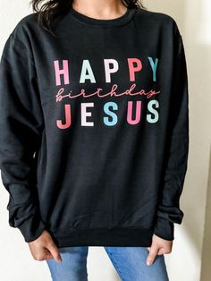 Celebrate the birth of Jesus in style with this cozy, unisex Happy Birthday Jesus Sweatshirt. This sweatshirt is perfect for any occasion, whether you’re attending a Christmas party or just want to show your faith. Enjoy the soft feel of this comfortable sweatshirt all season long! Jesus Sweatshirts, Happy Birthday Jesus, Motherhood Journey, Birth Of Jesus, White Sweatshirt, Clothing Company, Black Media, Mom Life, Unisex Sweatshirt