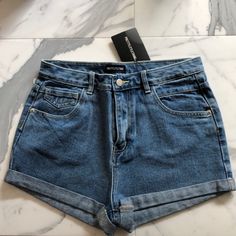 Size 4, Medium Blue Roll Up Denim Shorts, Runs Big. Trendy High Rise Denim Blue Jean Shorts, Trendy High Waist Denim Jean Shorts, Trendy Mid-rise Denim Jean Shorts, Trendy Mid-rise Blue Jean Shorts, Trendy High-waist Denim Jean Shorts, Trendy Dark Wash Jean Shorts, Trendy Short Denim Jeans, Trendy Dark Wash Short Jeans, Trendy Short Length Denim Jeans