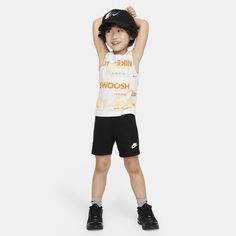 This 2-piece set is our take on the classic PE uniform. The graphic tank is made of smooth cotton jersey with lots of Swoosh love on display. The matching French Terry shorts are lightweight with a stretch waistband for comfy wear kiddos can run, jump, crawl and play in. Playful Nike Tops For Sports, Casual Training Tops With Logo Print, Casual Cotton Tops For Training, Nike Cotton Tank Top For Athleisure, Nike Cotton Tank Top For Workout, Nike Cotton Athleisure Tank Top, Nike Cotton Tank Top Athleisure, Nike Activewear For Summer Sports Events, Casual Tank Top With Letter Print For Training