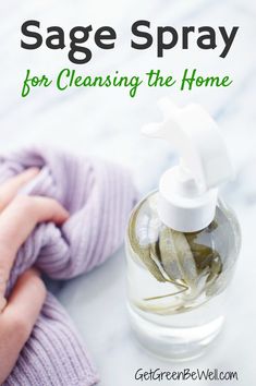 a hand holding a cloth next to a bottle with soap on it and the words sage spray for cleaning the home